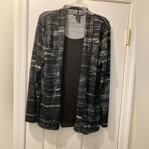 Stylish black top with a print attached jacket. Susan Lawrence size medium.